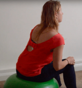How to exercise during pregnancy: pelvis mobility exercise, pelvis tilt on swiss ball left tilting How to exercise during pregnancy: pelvis mobility exercise, pelvis tilt on swiss ball left tilting