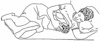 Good BreastFeeding Position: Baby breastfeeding with mumy lying on her side